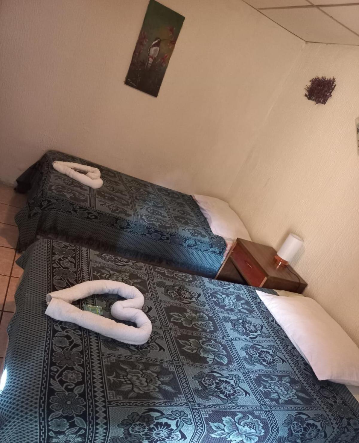Huellas Hostal Antigua Habitación foto