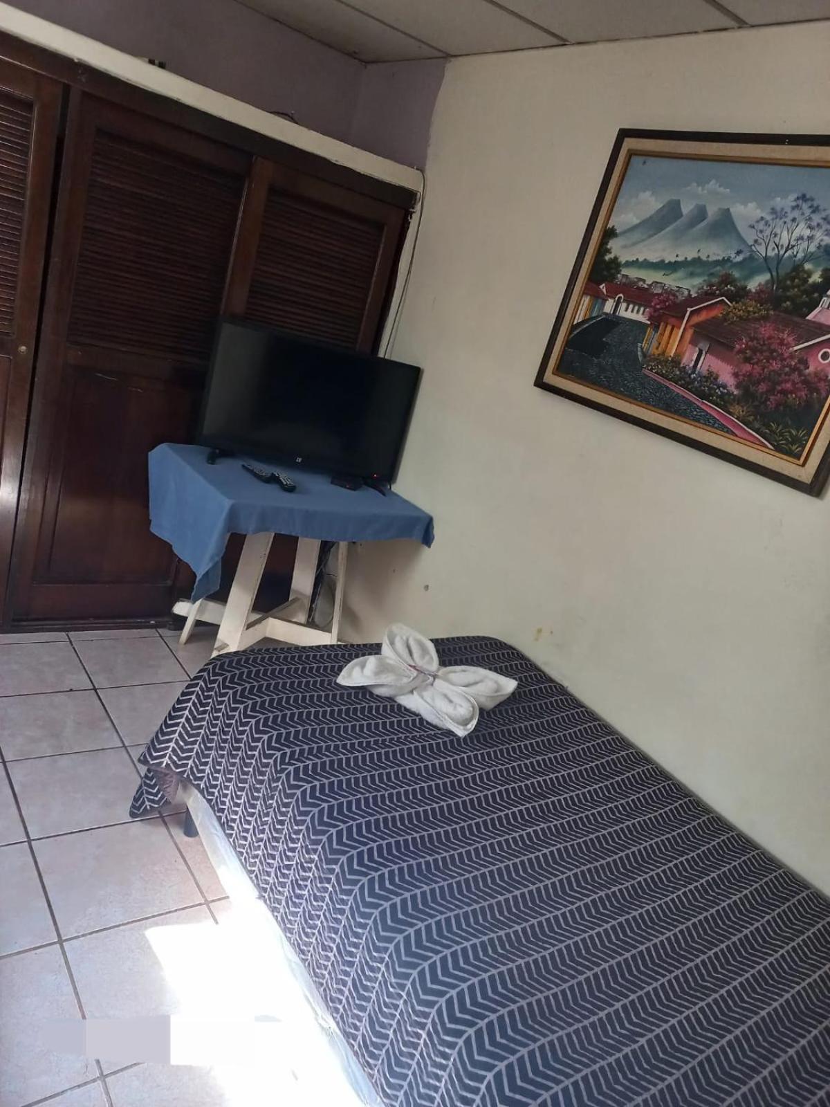 Huellas Hostal Antigua Habitación foto